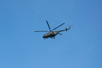 Russia, Saint Petersburg, 10.04.2019 Military helicopter in Russia against the blue sky