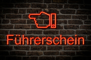 Fototapeta premium Leuchtreklame Führerschein