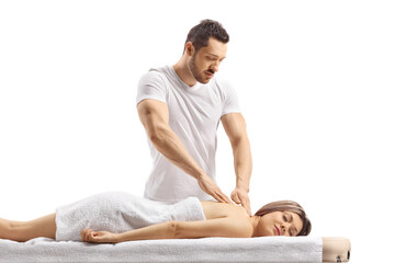 Masseur giving massage to a woman - obrazy, fototapety, plakaty