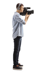Full length profile shot of a young cameraman recording