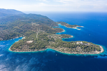 Obraz premium Aerial drone high angle shot of peninsula of Vis Island coastline in Adriatic sea in Croatia summer