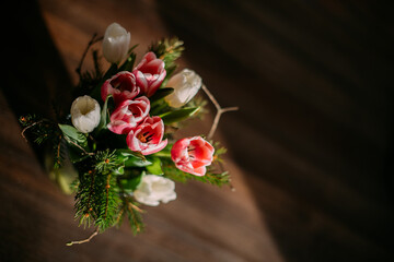 Bouquet of flowers on a wooden table. Top plan. Flatley