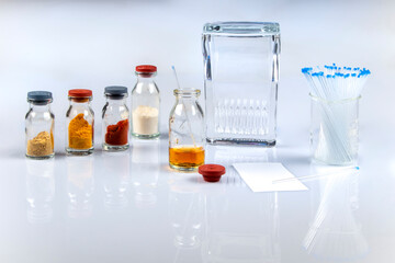 Thin layer chromatography equipments include jar, silica gel, capillary and compounds.