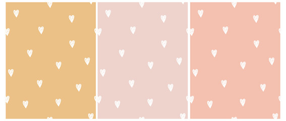 Cute Hand Drawn Irregular Romantic Seamless Vector Pattern. White  Hearts Isolated on a Light Pink, Pale Yellow and Sweet Pink Background. Funny Infantile Repeatable Print.