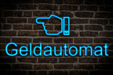 Obraz premium Leuchtreklame Geldautomat