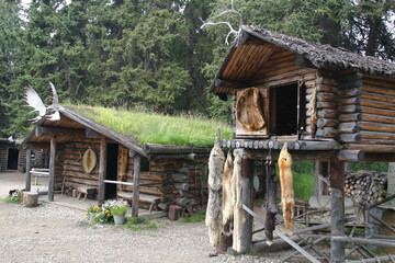 Athabaskan Village on the Chena River Tanana River Confluence Near Fairbanks with Fox Pelts Hanging...