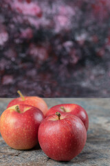 Juicy apples isolated on a concrete background