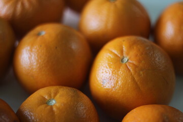 Kinnows is a hybrid fruit which looks like Orange © Trending Now