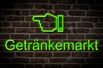 Fototapeta premium Leuchtreklame Getränkemarkt