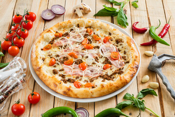 pizza with meat and vegetables