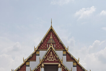 Naklejka premium AYUTTHAYA, THAILAND - MAY 25, 2018: Ayutthaya Historical Park in Ayutthaya (second capital of the Siamese Kingdom). A very popular destination for day trips from Bangkok. Wihan Phra Mongkhon Bophit.