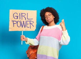 young pretty afro woman girl power concept