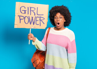 young pretty afro woman girl power concept