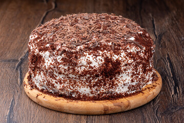 Creamy chocolate cake sprinkled with chocolate chips.