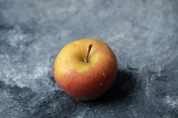 A fresh red apples on a marble background