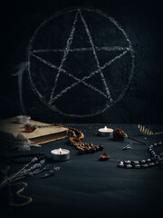 Black magic, the altar with the sign of the pentagram. A ritual to summon the devil or an evil...