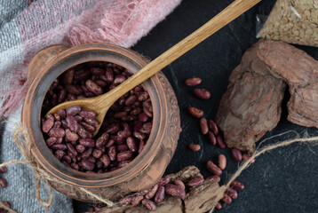 Pile of raw red beans in classic mug