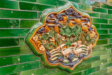 Beijing, China - April 27, 2010: Forbidden City. Closeup of flower and bird themed ceramics artwork...