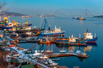 port of vladivostok city with ships in winter from Cape Egersheld