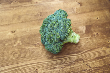 broccoli green on a brown wooden table
