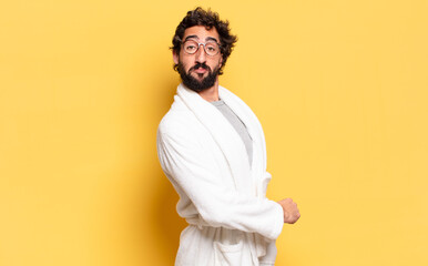 young bearded man wearing bathrobe