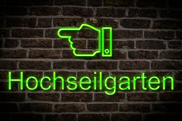 Fototapeta premium Leuchtreklame Hochseilgarten