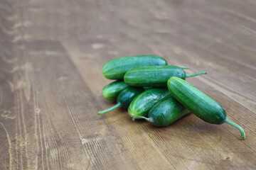 cucumbers on a wooden board