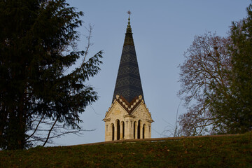 Fototapeta na wymiar Church tower at the old town of Bern, Capital of Switzerland. Photo taken February 24th, 2021, Bern, Switzerland.