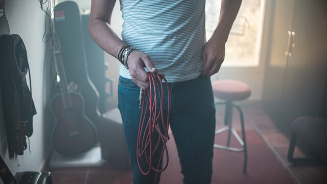 Guitarist in the recording studio composing a song. Concepts of singer-songwriter, electric guitar, band, learning, indie and alternative music
