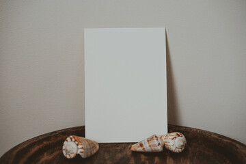 Blank white card in boho style interior
