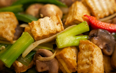 Close up of a fresh vegetarian thai meal with tofu and vegetables