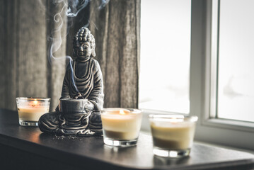 Candlestick in the shape of a buddha