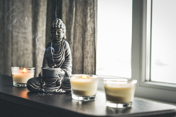 Candlestick in the shape of a buddha