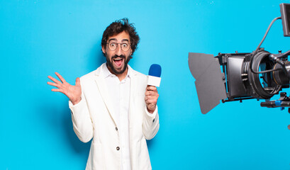 young bearded man television presenter.