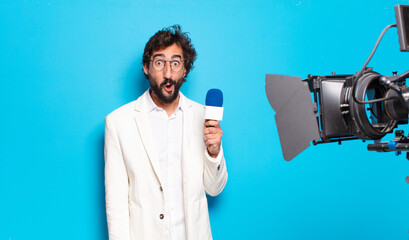 young bearded man television presenter.