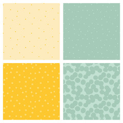 Polka dot seamless patterns. Vector dotted textures. Random Polka dots on yellow and green background. Pastel colors. Card templates.