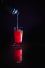 The reflection of sunrise cocktail in preparation
