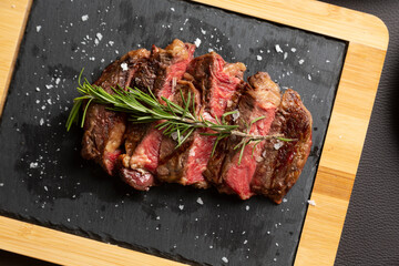 Closeup grilled Argentine beef chorizo bife top view.