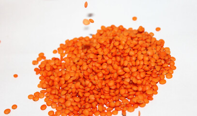 red lentil on white backround