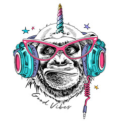 Fun Monkey in a pink glasses, in a headphones with a rainbow unicorn horn. Good vibes - lettering quote. Humor card, t-shirt composition, hand drawn style print. Vector illustration.