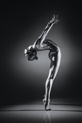 Fototapeta na wymiar Young woman stretching