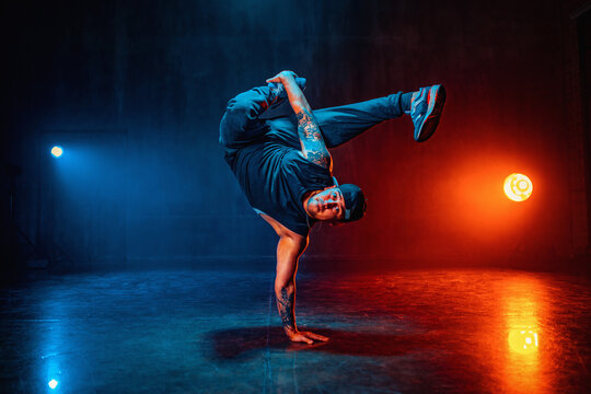 Man break dancing - Powered by Adobe