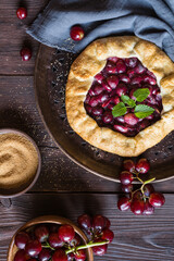 Traditional homemade Galette pie with red grapes