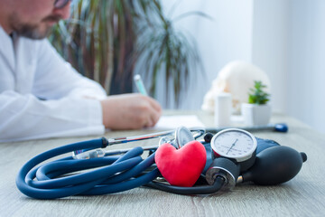 Heart health and diagnosis and treatment of cardiac disease concept photo. In foreground figure of...