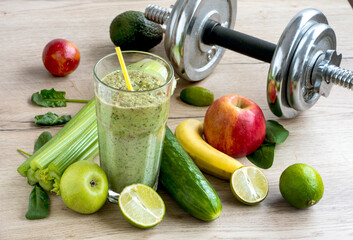 Green spinach and celery smoothie. The beginning of healthy habits and a healthy lifestyle. Chrome...