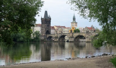 Fototapeta na wymiar Vltava river and Charles bridge in Prague in the Czech Republic