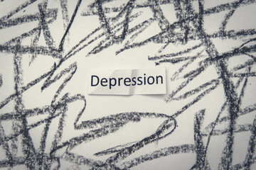 Sign word depression on a background made with a messy black pen lines as a symbol of anxiety