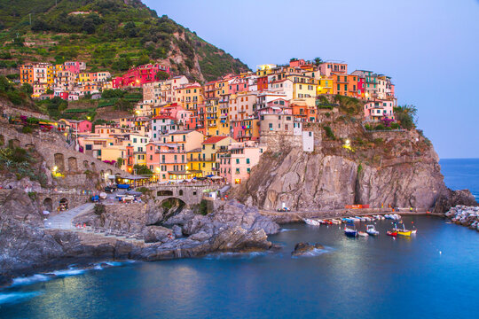 Colorful villages in Cinque terre, Italy and seascape at sunset