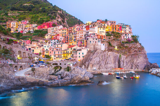 Colorful villages in Cinque terre, Italy and seascape at sunset