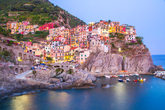 Colorful villages in Cinque terre, Italy and seascape at sunset